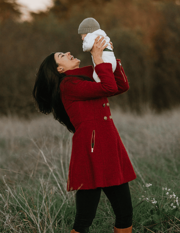 Ashley Thompson holding landon